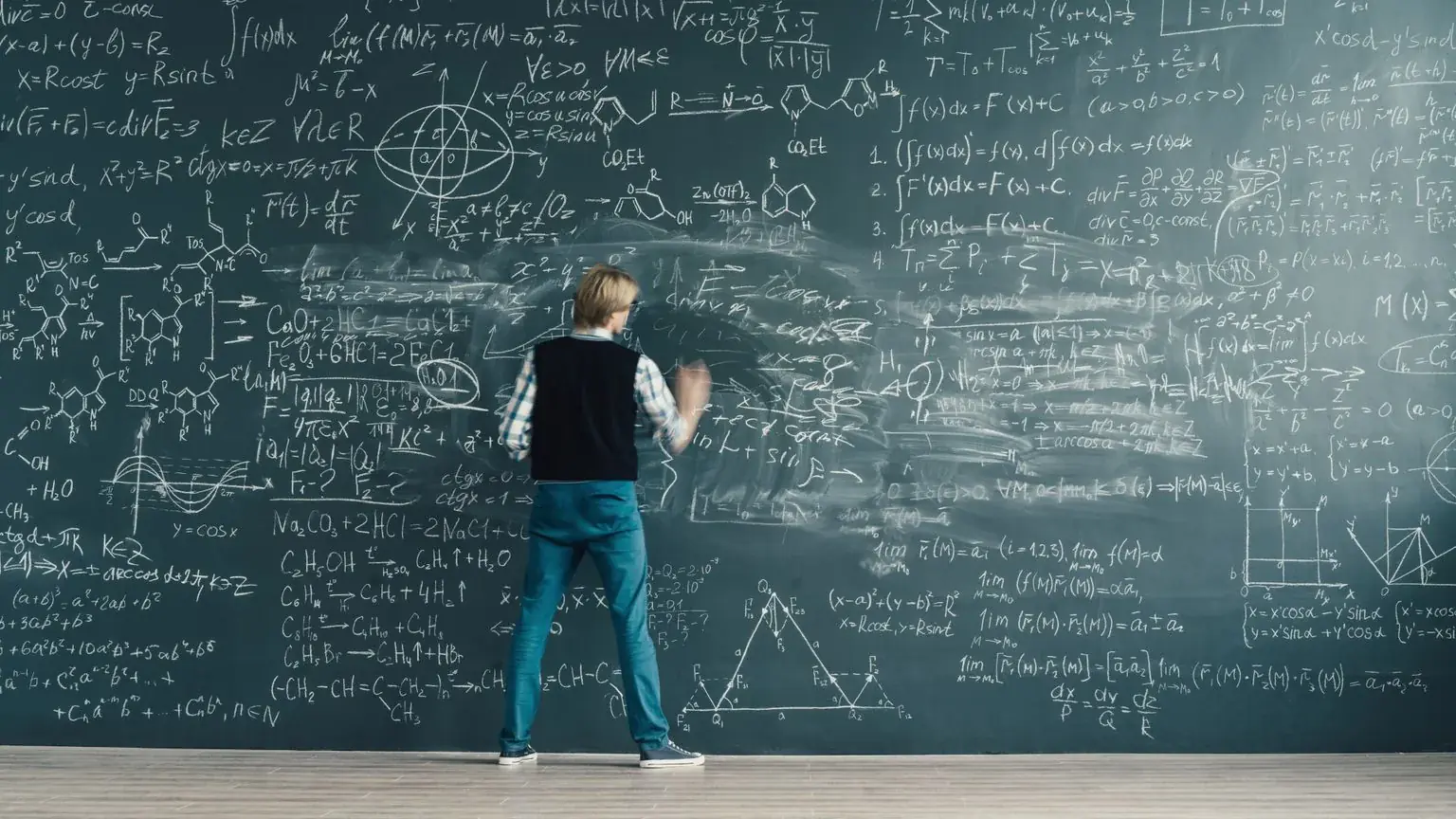A university student reviewing maths work with a tutor